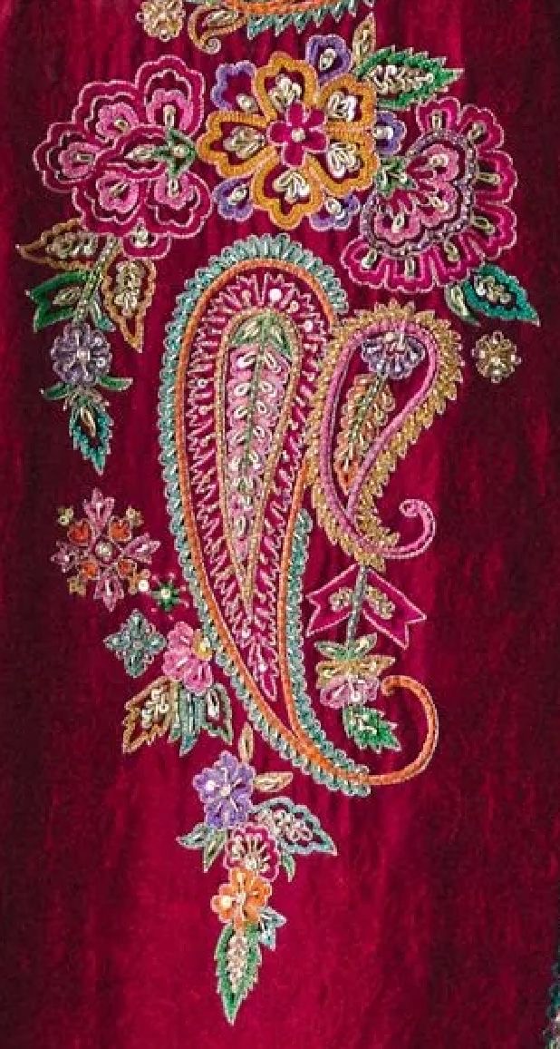 A motif reference combining bright flowers, paisley shapes and a pink ground.